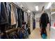 Large walk-in closet with custom shelving, perfect for organizing your wardrobe with extra space for your wardrobe at 1144 Bellewood Sq, Dunwoody, GA 30338