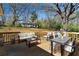Spacious back deck with outdoor seating, dining area, and a view of the lush backyard at 2215 Gordon Se Cir, Smyrna, GA 30080