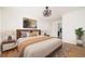 Inviting bedroom with wood accents, a comfortable bed, and chic décor at 2215 Gordon Se Cir, Smyrna, GA 30080