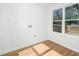 Sunlit room with wood floors; a perfect blank slate to make your own at 2215 Gordon Se Cir, Smyrna, GA 30080