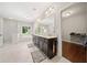 Open bathroom with dual vanity, soaking tub and glass shower at 6090 Pennant Ln, Suwanee, GA 30024