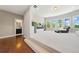 Bonus room with hardwood flooring, plush carpet, recessed lights and large windows at 6090 Pennant Ln, Suwanee, GA 30024
