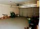 A spacious garage with ample storage space for vehicles and equipment, perfect for home improvement enthusiasts at 921 Hemingway Rd, Stone Mountain, GA 30088