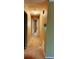 Hallway with wall-mounted thermostat and carpeted floor at 921 Hemingway Rd, Stone Mountain, GA 30088