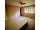 Bedroom with neutral walls, carpeted floors, and a ceiling fan at 921 Hemingway Rd, Stone Mountain, GA 30088