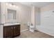 A full bathroom showcasing a vanity with granite countertop, toilet, and bathtub with shower at 1067 Brittania Rd, Stone Mountain, GA 30083
