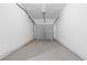 Empty garage with gray door at 1067 Brittania Rd, Stone Mountain, GA 30083