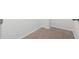 Close up of the staircase corner, with white trim and neutral carpet at 1067 Brittania Rd, Stone Mountain, GA 30083