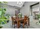 Neutral dining room showcasing a wooden table, chairs, and an open doorway at 2486 Ridgelake Dr, Villa Rica, GA 30180