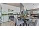 Open-concept kitchen with stainless steel appliances, and a seamless flow to the living area at 2486 Ridgelake Dr, Villa Rica, GA 30180