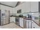 Well-equipped kitchen with stainless steel appliances, granite countertops, and ample cabinet space at 2486 Ridgelake Dr, Villa Rica, GA 30180