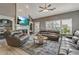 Comfortable living room with high ceilings, fireplace, and plush leather seating at 2486 Ridgelake Dr, Villa Rica, GA 30180