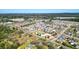 Aerial view highlighting community amenities: pool, playground, and clubhouse at 28 Summer Nw Pl, Cartersville, GA 30121