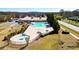 Aerial view of the community pool, playground, and other recreational facilities at 28 Summer Nw Pl, Cartersville, GA 30121