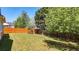 Private backyard with green grass and wood fence, offering a serene outdoor space at 28 Summer Nw Pl, Cartersville, GA 30121