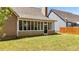 A view of the backyard showing the screened-in porch at 28 Summer Nw Pl, Cartersville, GA 30121