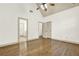 Spacious bedroom featuring hardwood floors and a ceiling fan at 28 Summer Nw Pl, Cartersville, GA 30121
