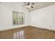 Bedroom featuring hardwood floors, natural light, and ceiling fan at 28 Summer Nw Pl, Cartersville, GA 30121