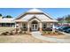 Community clubhouse featuring stone columns and a well-manicured lawn at 28 Summer Nw Pl, Cartersville, GA 30121