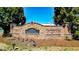 Elegant stone entrance to Four Seasons community with lush landscaping at 28 Summer Nw Pl, Cartersville, GA 30121