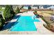 Aerial view of pool and playground with trees in community at 28 Summer Nw Pl, Cartersville, GA 30121