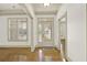 Elegant foyer boasting newly refinished hardwood floors, designer paint, and classic trim at 28 Summer Nw Pl, Cartersville, GA 30121