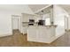Kitchen with white cabinetry, granite countertops, and modern black appliances at 28 Summer Nw Pl, Cartersville, GA 30121