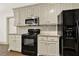 Kitchen with stainless steel appliances and shaker cabinets at 28 Summer Nw Pl, Cartersville, GA 30121