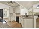 Well-lit kitchen featuring custom cabinetry, granite countertops, and stainless steel appliances at 28 Summer Nw Pl, Cartersville, GA 30121