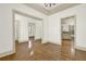 Open living room with hardwood floors, fresh neutral paint, and an open floor plan at 28 Summer Nw Pl, Cartersville, GA 30121