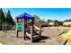 Community playground featuring a colorful playset, slide, and -friendly design for outdoor fun at 28 Summer Nw Pl, Cartersville, GA 30121