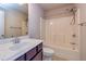 A simple bathroom features a shower-tub combination and a single sink vanity at 2808 White Oak Ln, Decatur, GA 30032