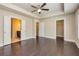Spacious bedroom boasts hardwood floors and access to an ensuite bathroom and walk-in closet at 2808 White Oak Ln, Decatur, GA 30032