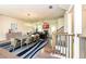 Open-concept dining and living space with modern lighting and a comfortable atmosphere at 2808 White Oak Ln, Decatur, GA 30032