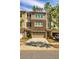 Charming townhome with a two-car garage and well-maintained landscaping at 2808 White Oak Ln, Decatur, GA 30032