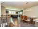 Spacious kitchen and dining area with dark cabinets and an island perfect for entertaining at 2808 White Oak Ln, Decatur, GA 30032
