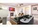 Cozy living room with a fireplace, ceiling fan, and modern decor for comfortable living at 2808 White Oak Ln, Decatur, GA 30032
