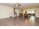 Open-concept living space with hardwood floors leading to the dining area and kitchen at 2808 White Oak Ln, Decatur, GA 30032