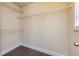 Functional walk-in closet featuring wood-look floors and white wire shelving for optimal storage at 2808 White Oak Ln, Decatur, GA 30032