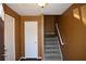 Entryway features a staircase, neutral walls and contrasting dark wood-look floors at 5229 Pinnacle Pointe Ct, Norcross, GA 30071