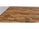 Close up of newly installed and stained beautiful hardwood flooring at 1047 Winding Branch Ct, Atlanta, GA 30338