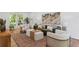 A well-lit living room features hardwood floors, neutral furniture, and a decorative rug at 1047 Winding Branch Ct, Atlanta, GA 30338