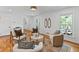 Inviting living room with hardwood floors, natural light, and a cozy seating arrangement at 1047 Winding Branch Ct, Atlanta, GA 30338