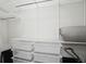 Walk-in closet features wire shelving and ample space for storage at 1050 Stacks Ave # 1507, Atlanta, GA 30315