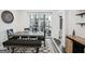 Dining area with a table, bench, and access to the outdoor balcony at 1050 Stacks Ave # 1507, Atlanta, GA 30315