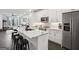 Open kitchen featuring a large island with white countertop and stainless steel appliances at 1050 Stacks Ave # 1507, Atlanta, GA 30315