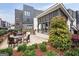 Outdoor seating area with comfortable chairs and a grill under a covered patio at 1050 Stacks Ave # 1507, Atlanta, GA 30315