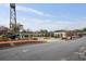 Charming neighborhood street featuring a mix of residential and commercial buildings on a sunny day at 1050 Stacks Ave # 1507, Atlanta, GA 30315