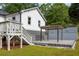 Spacious backyard featuring deck, pergola, and lush lawn at 1711 Terry Mill Se Rd, Atlanta, GA 30316