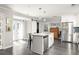 Spacious kitchen with a central island, stainless steel appliances, and convenient access to the outdoor patio at 1711 Terry Mill Se Rd, Atlanta, GA 30316